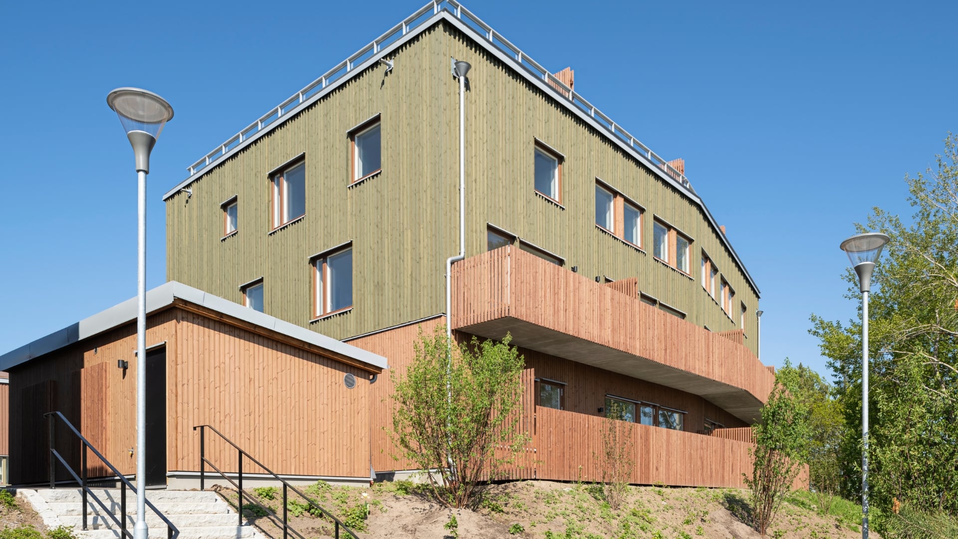 Fasad av ThermoWood med BT PIgment grön och brun