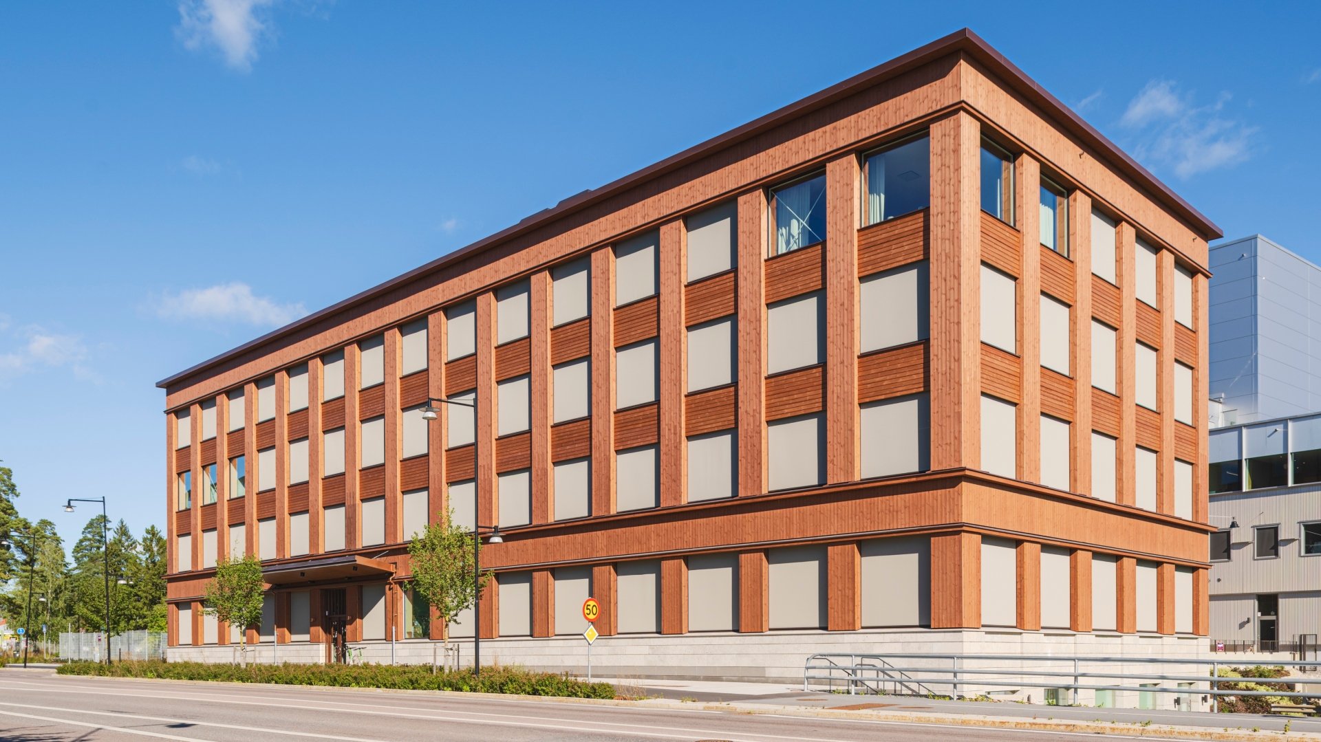 Fasad av ThermoWood BT Pigment Naturbrun