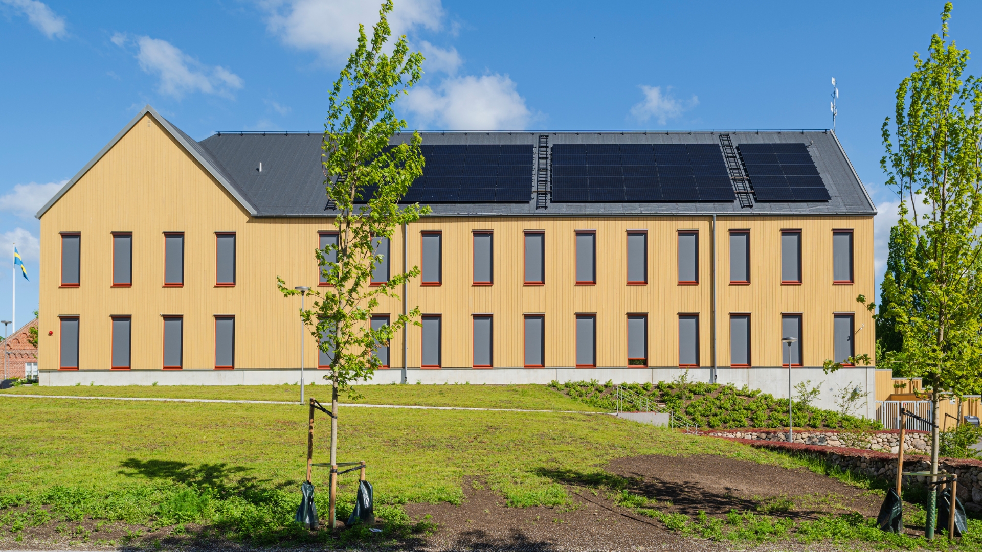 Fasad av ThermoWod med BT Pigment Ockragul