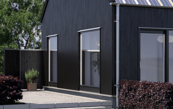 Svart ytterpanel av ThermoWood med Råborstad yta