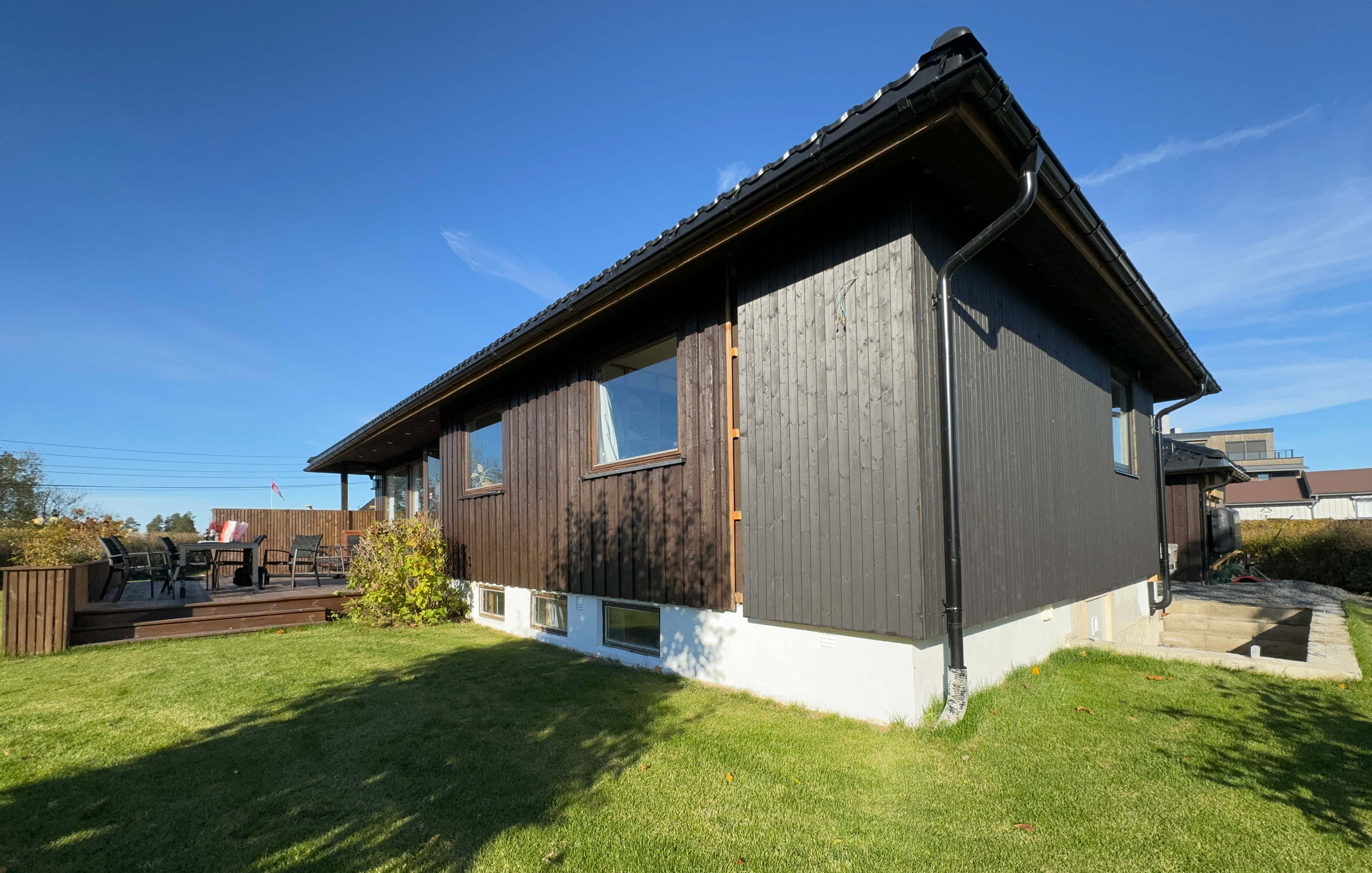 Hus med delvis ny kledning med skjult innfesting Heftig PRO+